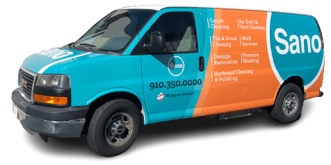 Sano Steam branded teal and orange service van showing passenger side with company logo, phone number, and service list